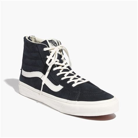 navy blue high top vans.